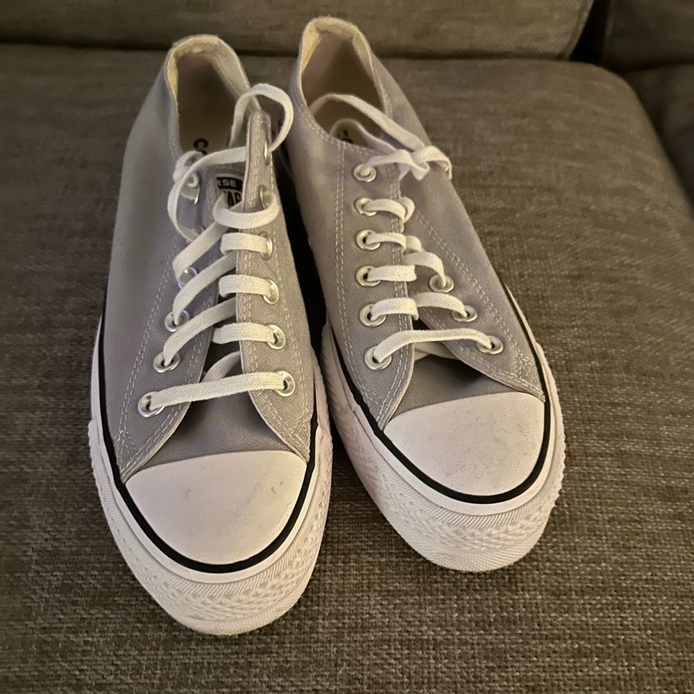 Cool Converse tennis shoes. Never worn. Very new, very nice quality.
